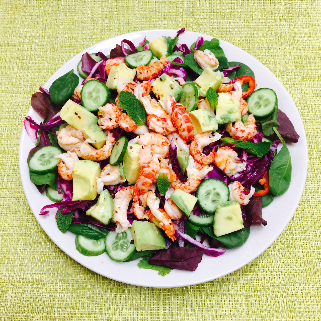 Crayfish salad with avocado, red cabbage and cucumber