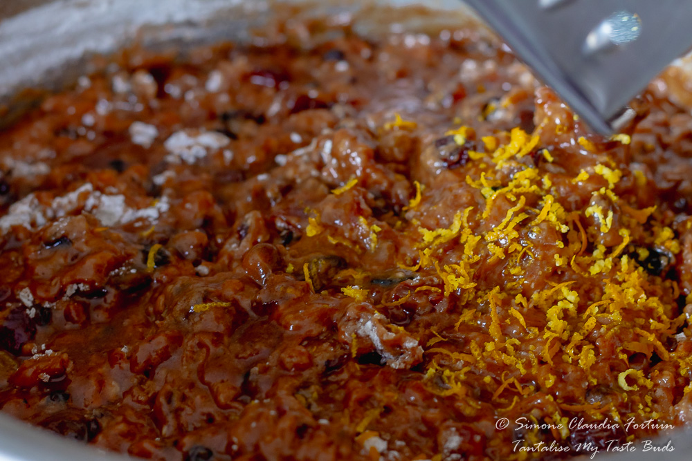 Adding grated orange rind to the Old Fashioned Spiced Boiled Fruit Cake
