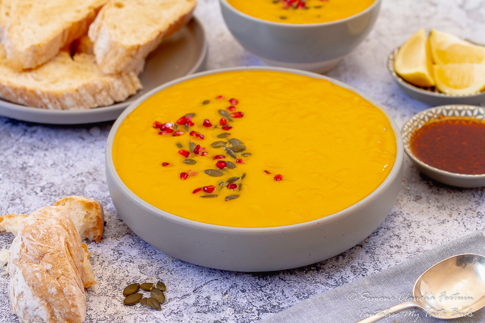 Carrot and Pumpkin soup without cream with crusty bread and chili oil